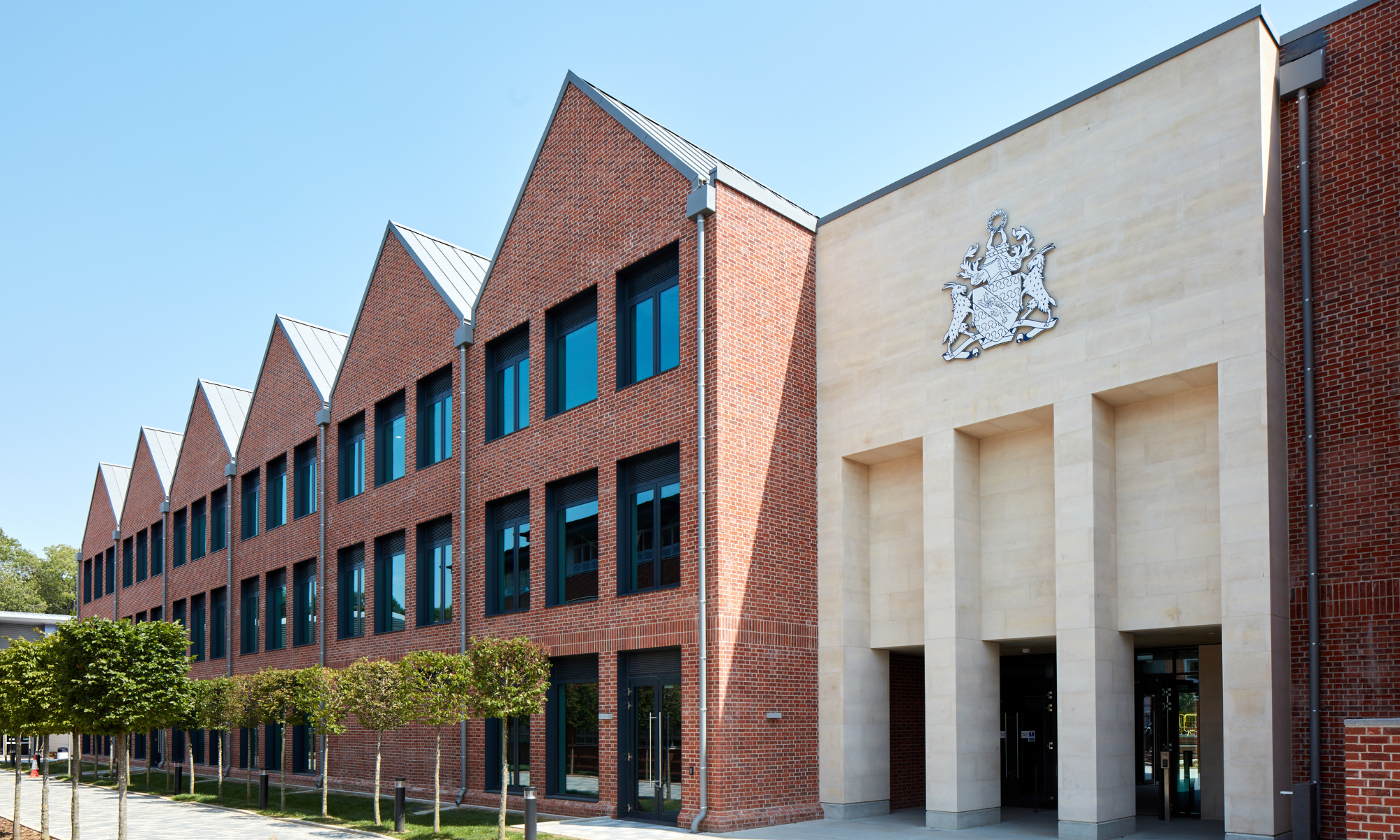 Photo showing a new school building on a sunny day
