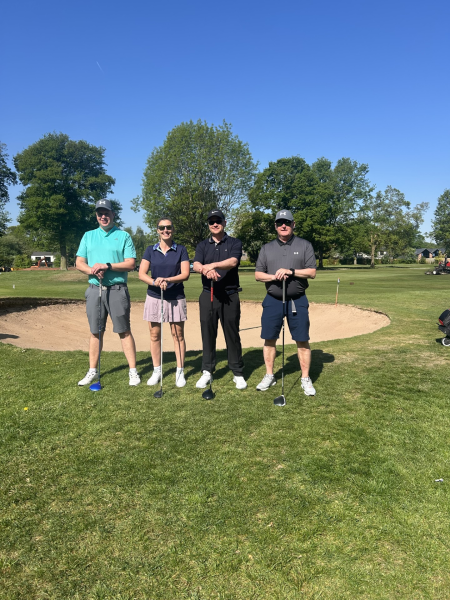 People at a golf course.