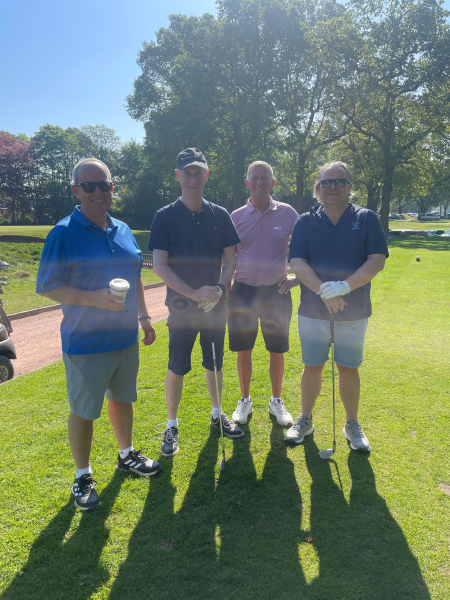 People at a golf course.